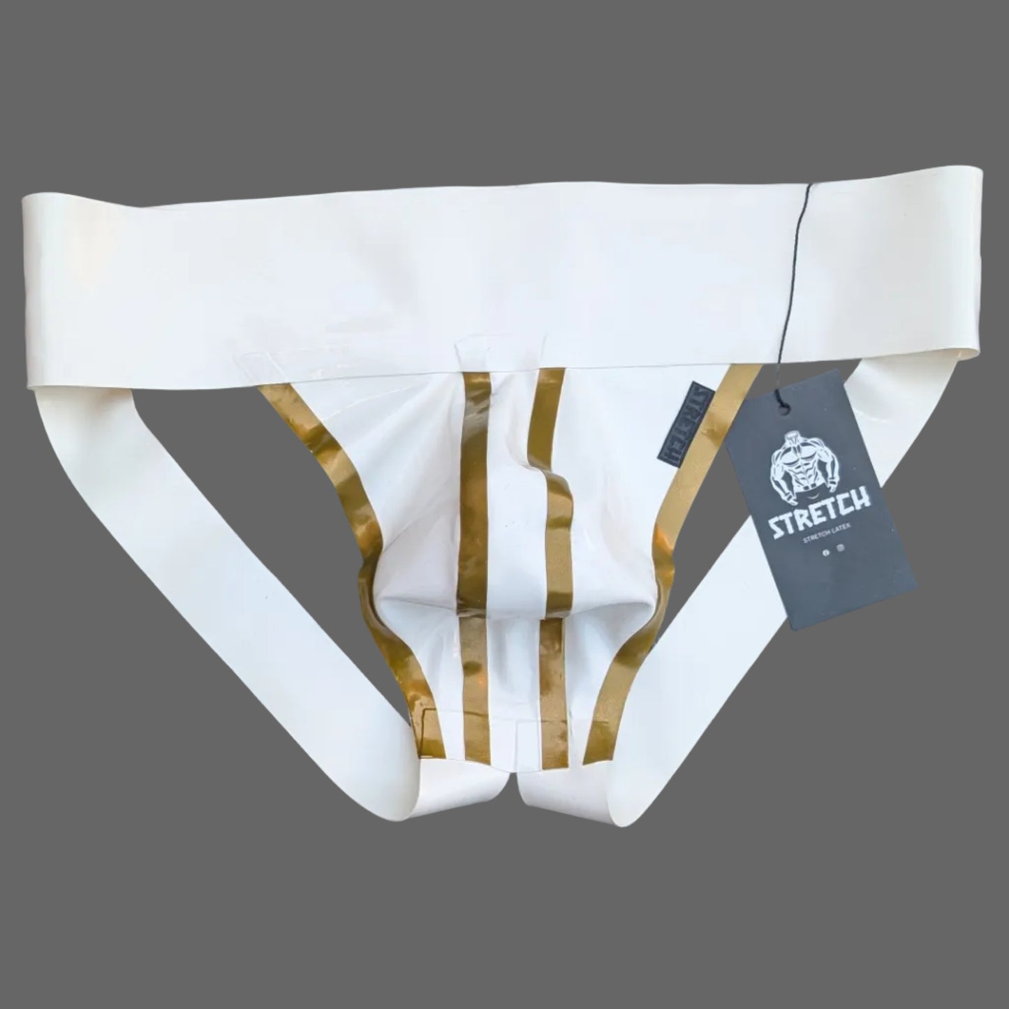 White men's underwear with gold accents on a dark fabric background
